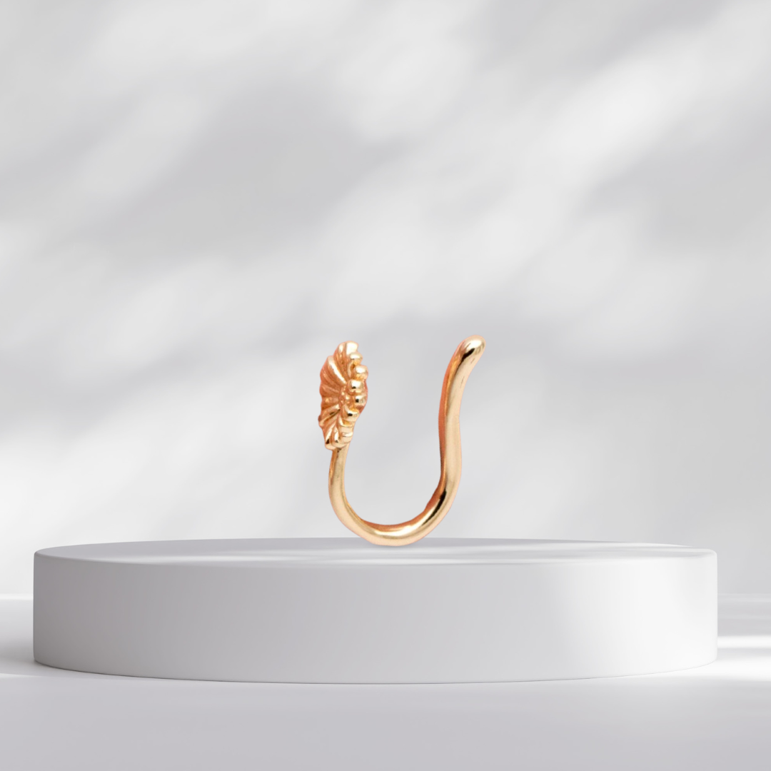 Gold Daisy Flower Clip on a white platform against a light gray background