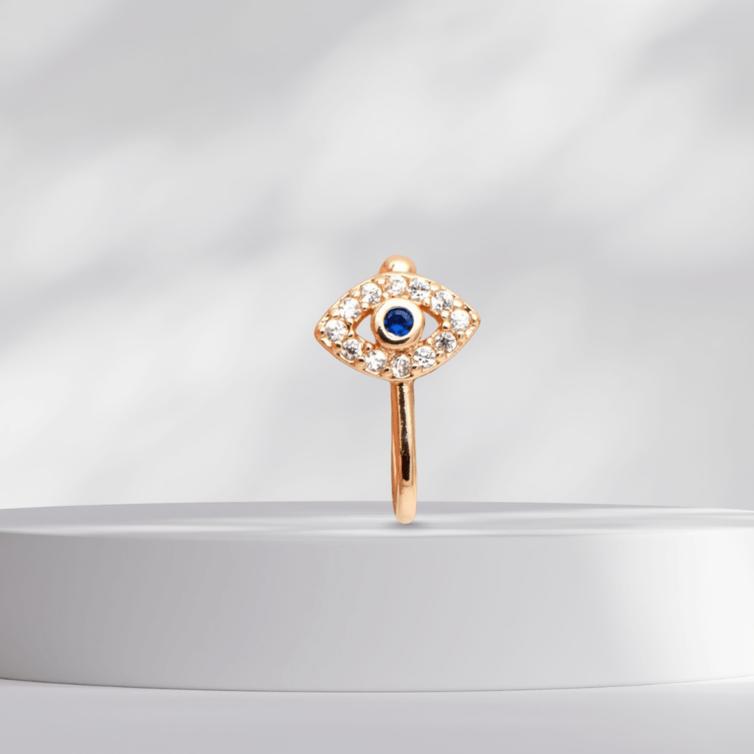 Evil Eye Nose Cuff Dainty Accessories on a white platflorm