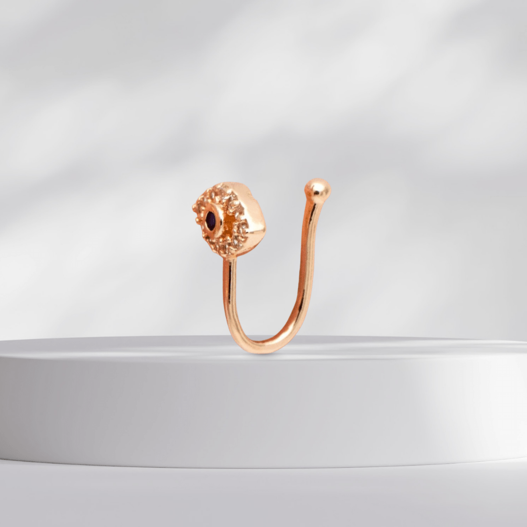 Evil Eye Nose Cuff Dainty Accessories on a white platflorm
