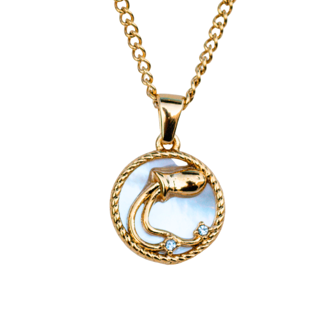 Close-up of an aquarius 18k gold zodiac necklace pendant on a delicate chain, representing a personalized astrological sign - MaeMae Jewelry