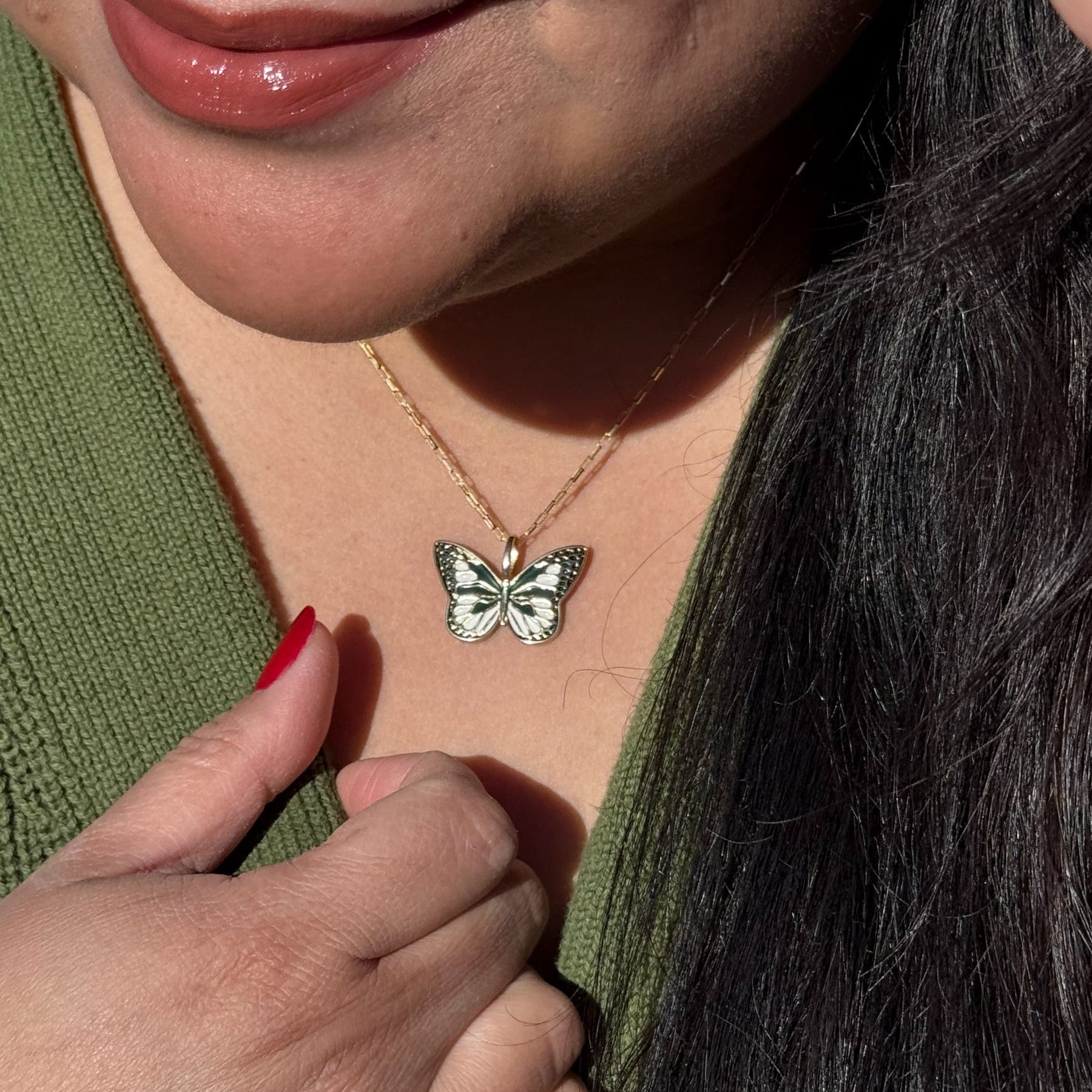 Flutter Butterfly Necklace - Dainty enamel and gold filled green white and gold butterfly charm on mini elongated Venetian chain close up on neck - 14k Gold-Filled - MaeMae Jewelry