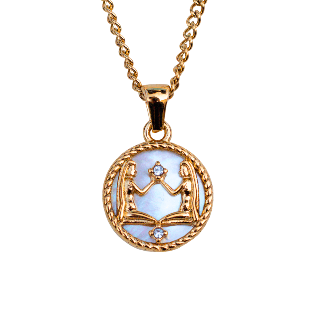 Close-up of a gemini 18k gold zodiac necklace pendant on a delicate chain, representing a personalized astrological sign - MaeMae Jewelry
