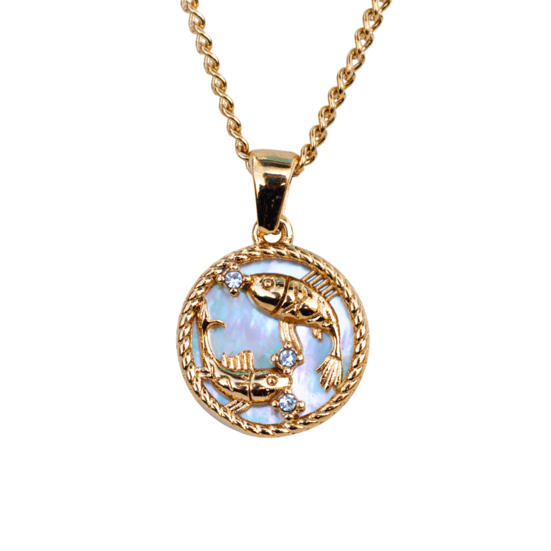 Close-up of a pisces 18k gold zodiac necklace pendant on a delicate chain, representing a personalized astrological sign - MaeMae Jewelry