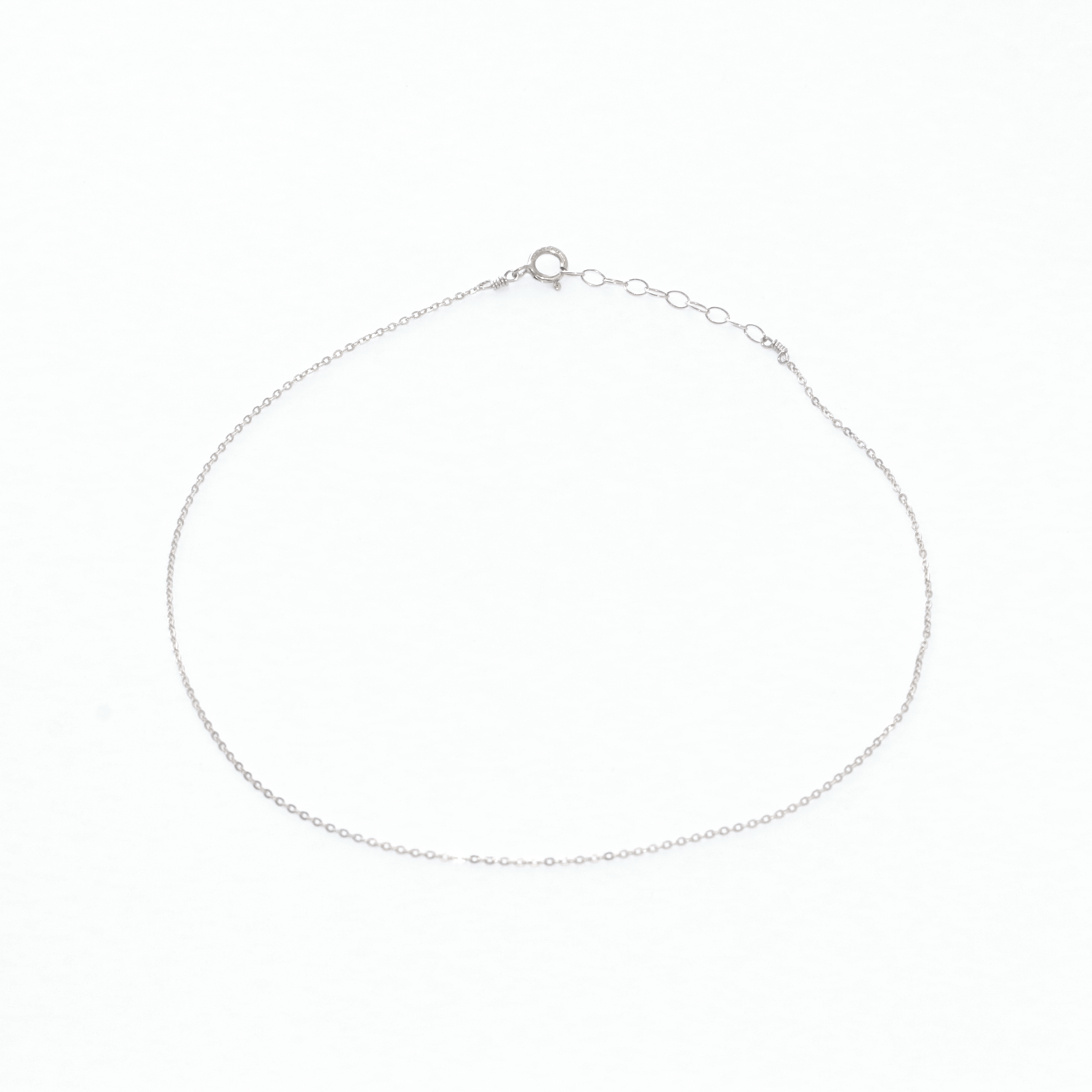 Glitter Glow silver chain anklet on a white background