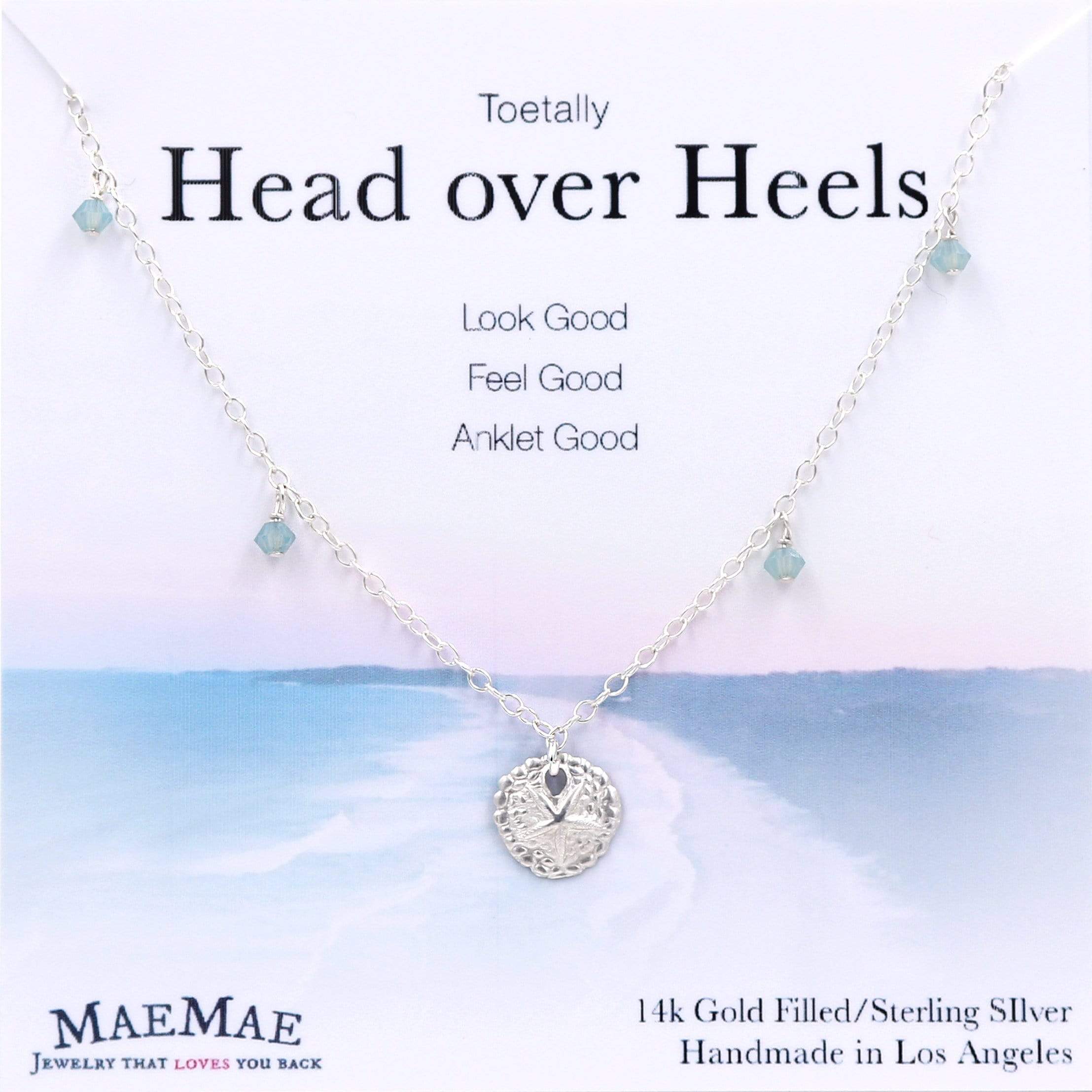 Silver sand dollar pendant anklet on card
