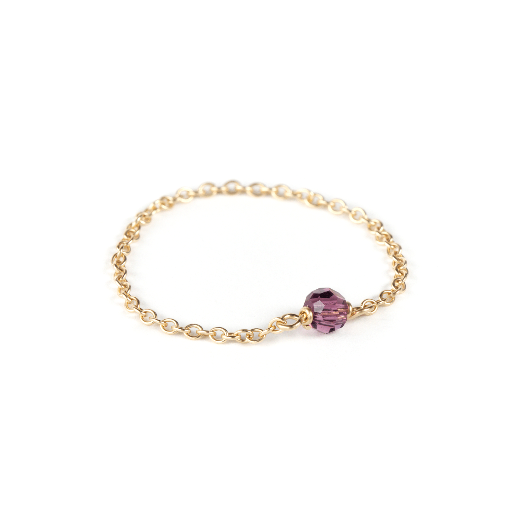 amethyst birthstone gold chain ring on white background