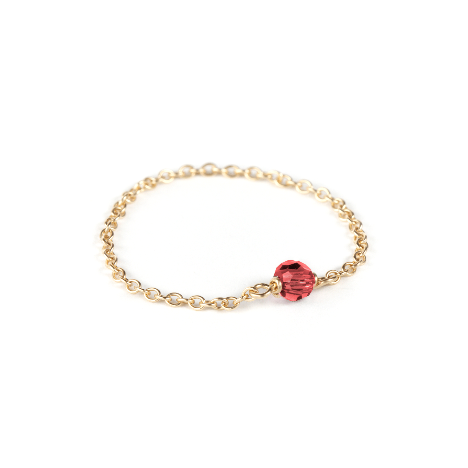 ruby birthstone gold filled chain ring on white background