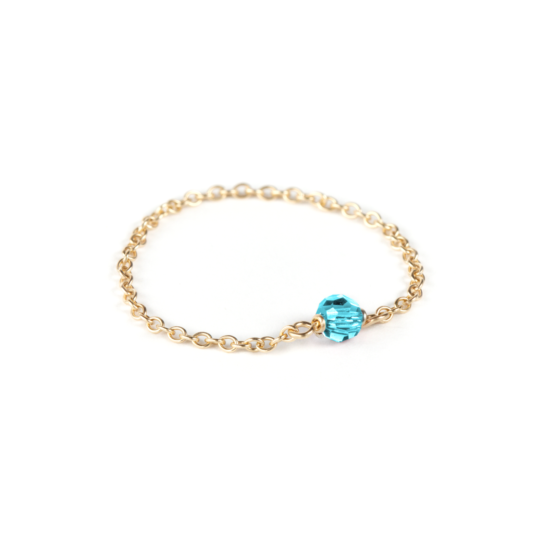 Aquamarine birthstone gold filled chain ring on white background