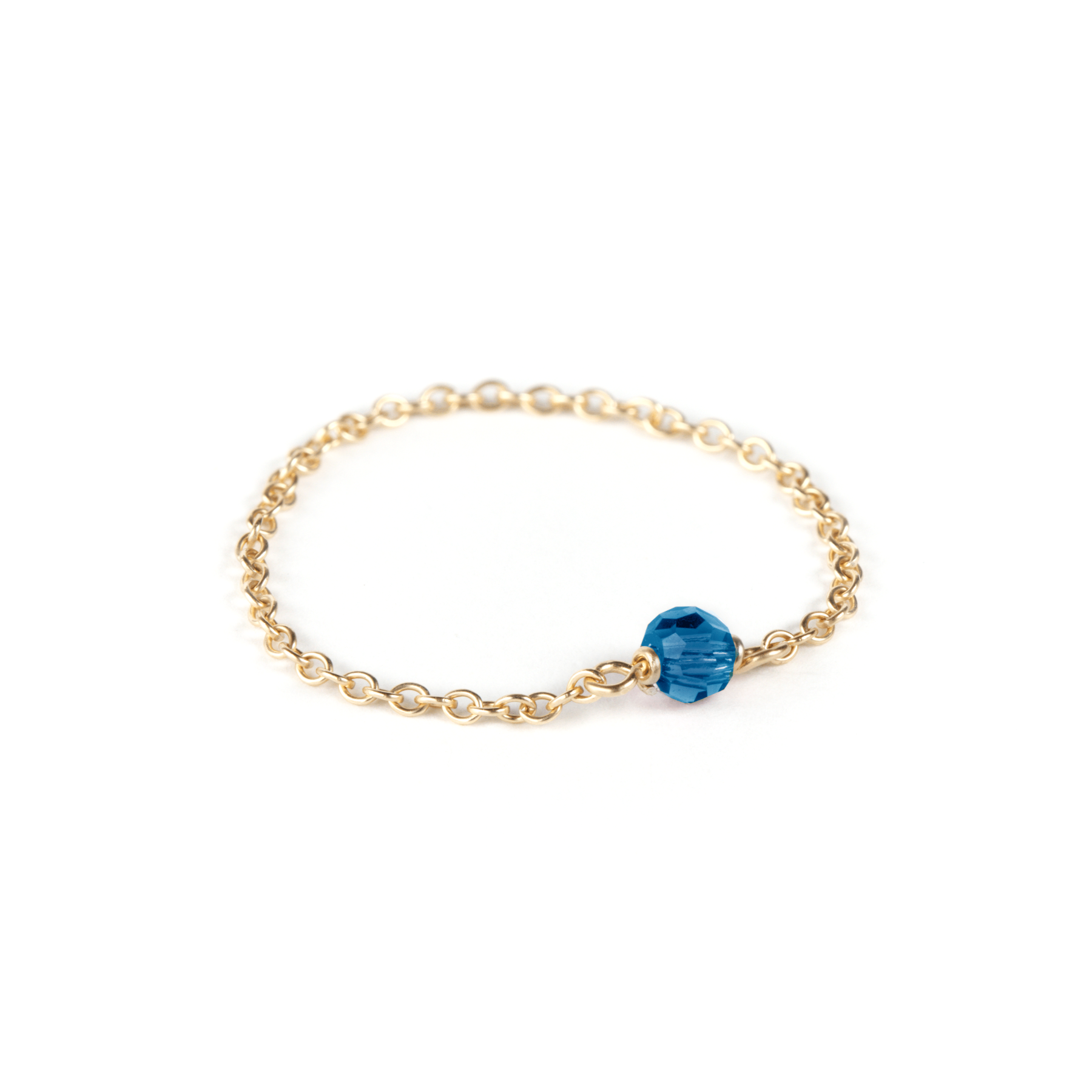 sapphire birthstone gold filled chain ring on white background