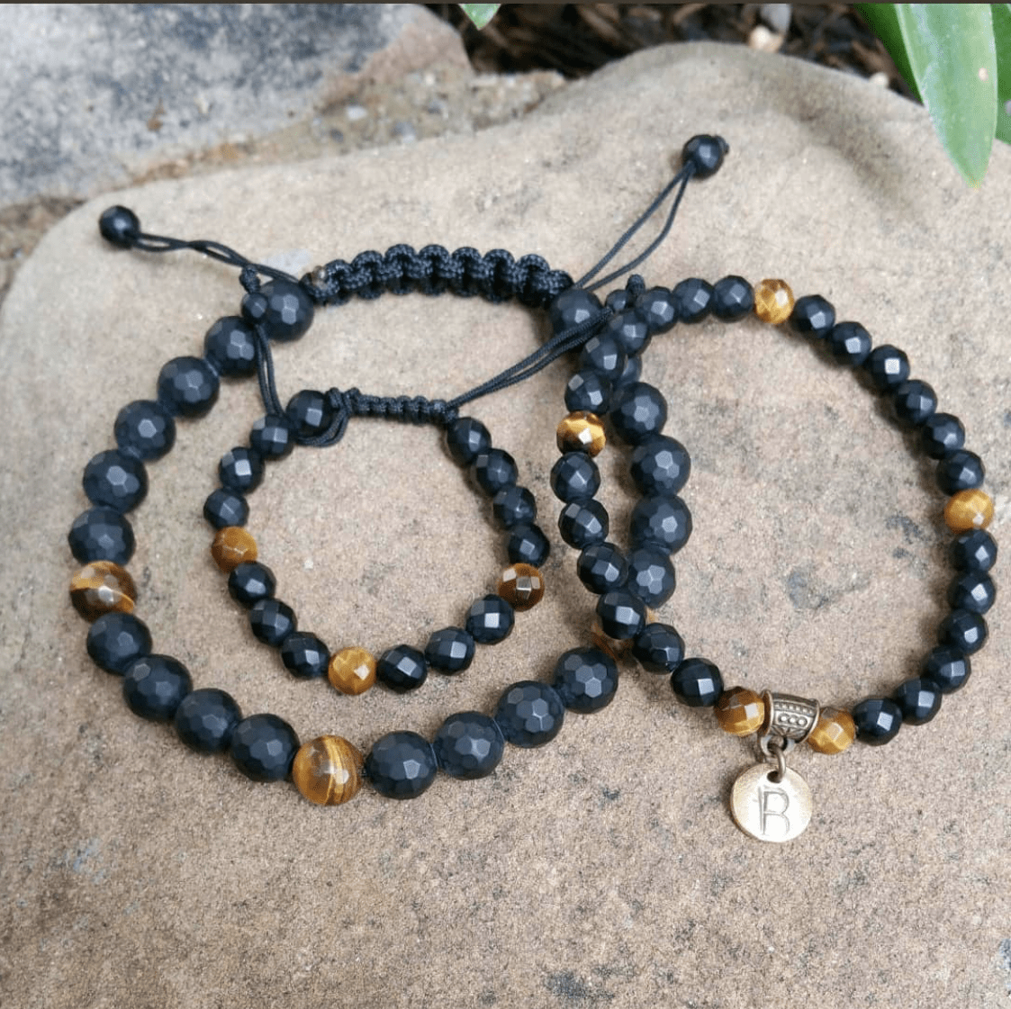 MaeMae Family onyx and tiger custom healing stone bracelets.