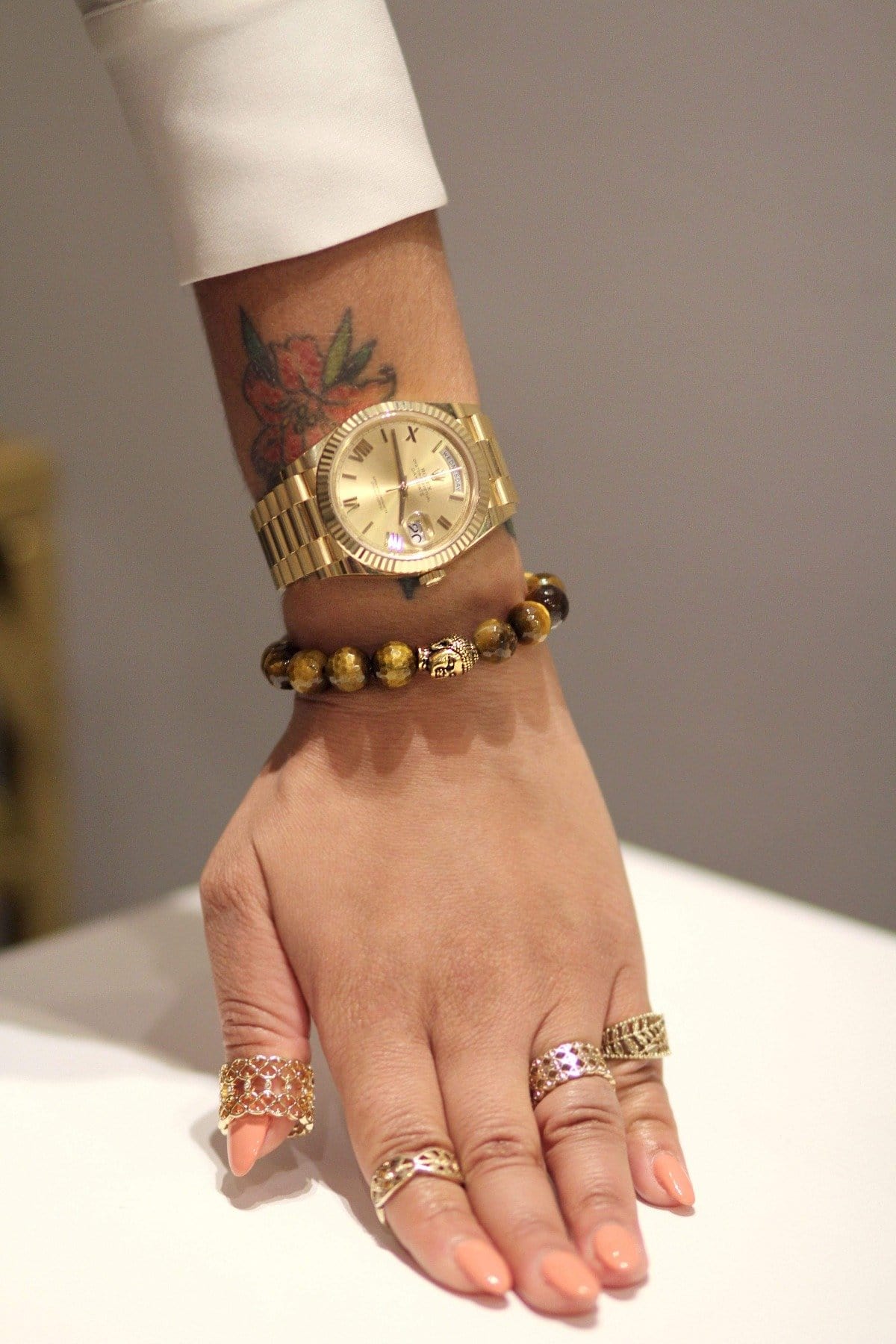 MaeMae Custom Healing Stone Bracelet using Tigers Eye and a Gold Buddha Charm.