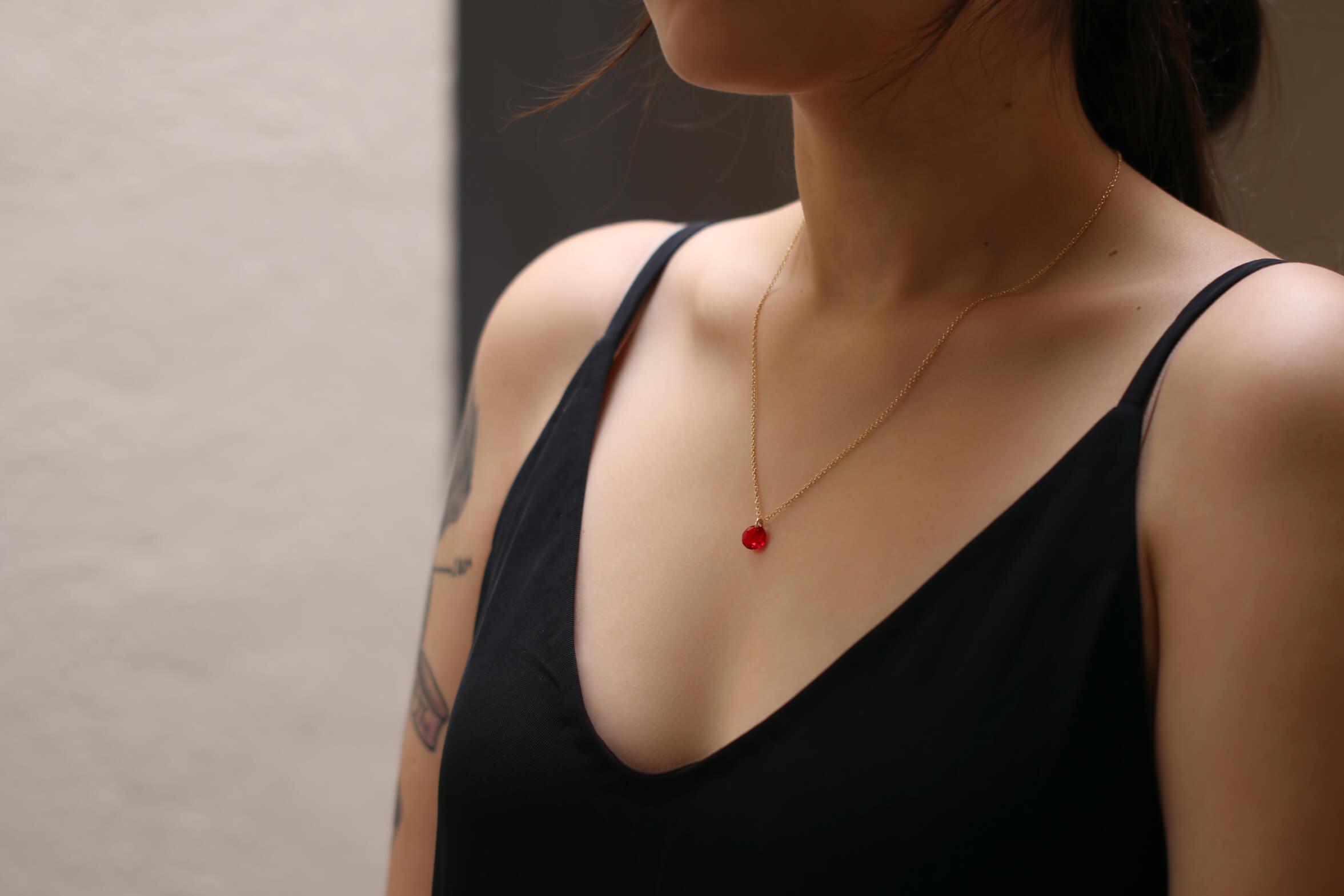 Wearing a dainty MaeMae Birthstone Necklace - Crystal Pendant (swaraovski crystal).