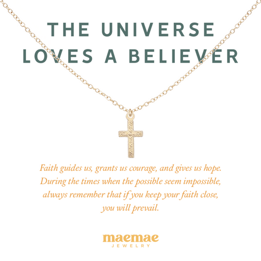 MaeMae Jewelry the universe loves a believer gold cross pendant and chain necklace on affirmation card
